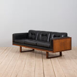 Poul Cadovius "Governor" sofa in rosewood and black leather, Denmark, 1960s.