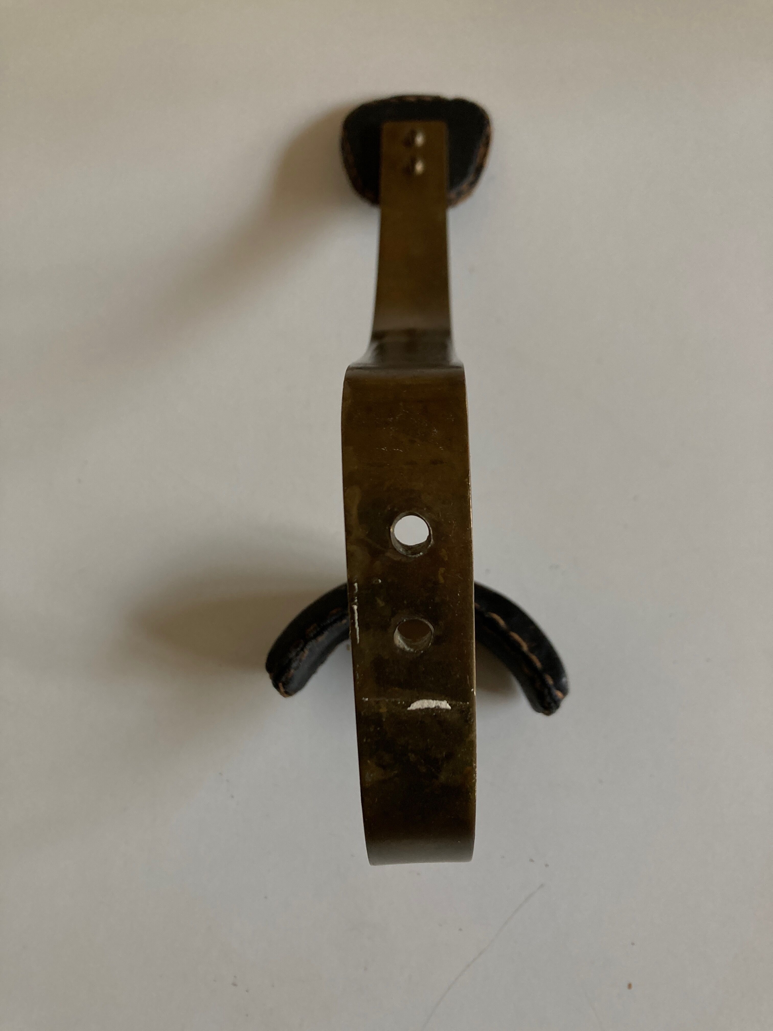 Adnet hook in bronze and leather 1950