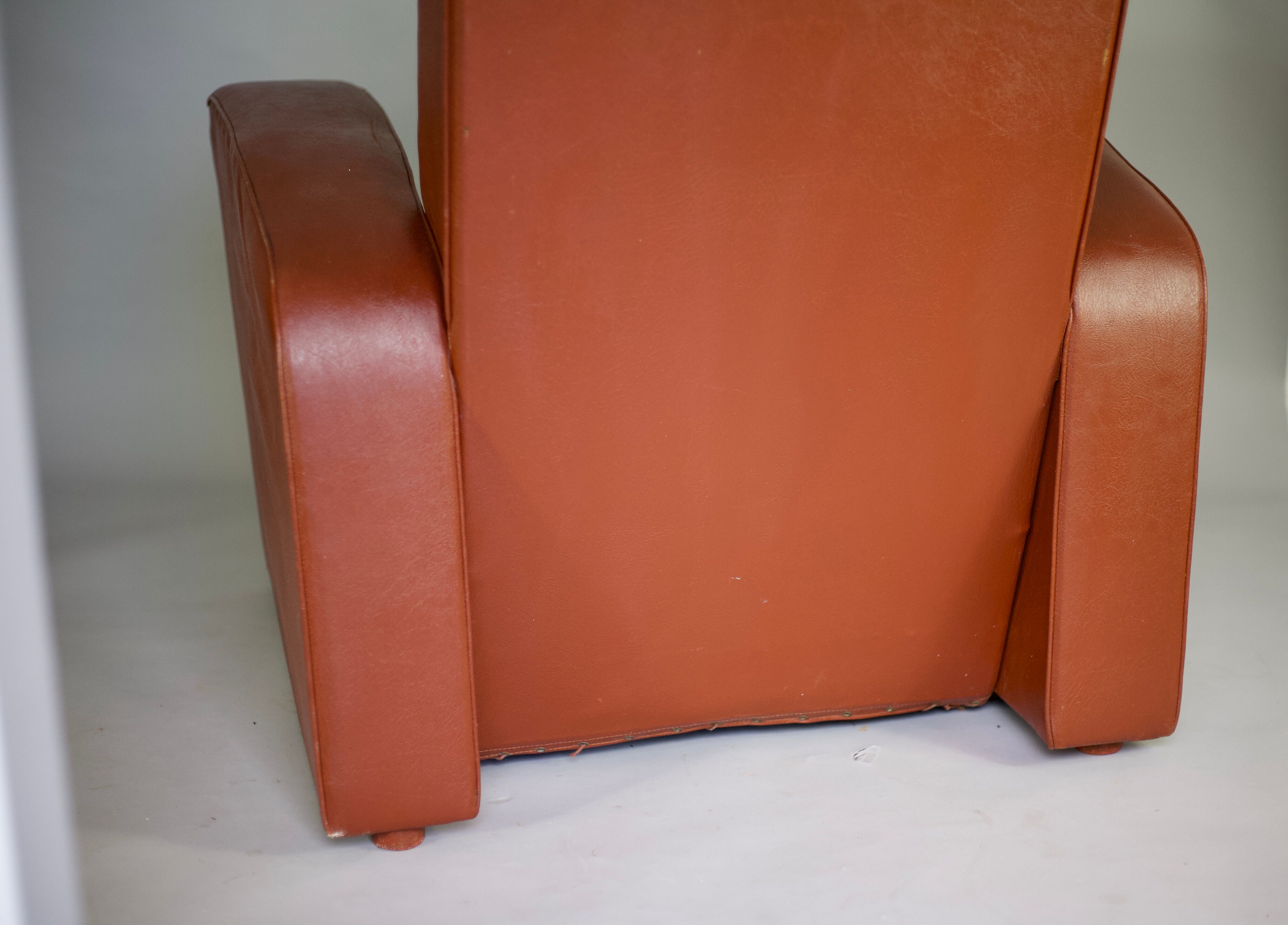 Armchair edited by Airborne, faux leather, France, circa 1950