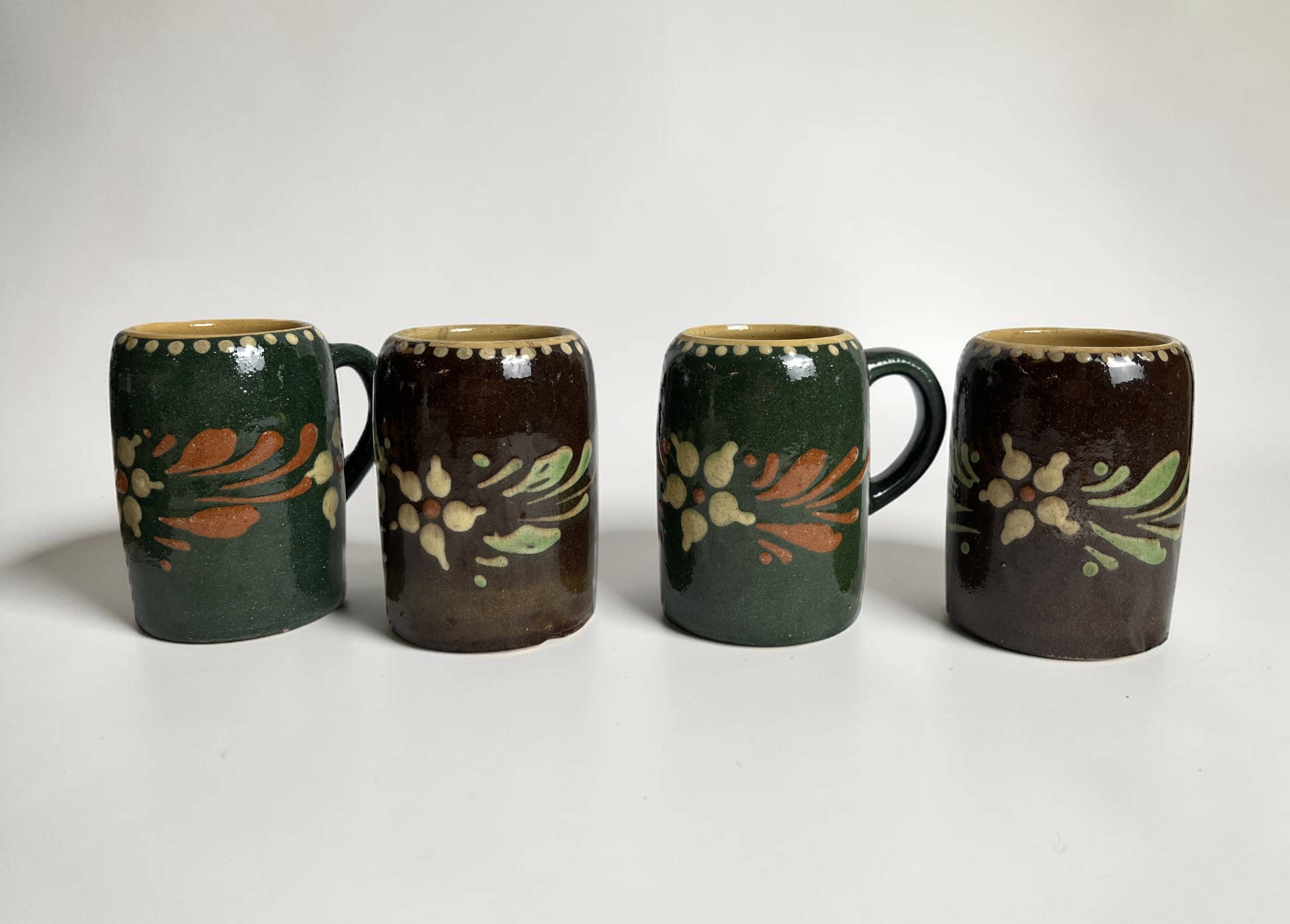 Alsatian pottery, glazed stoneware mug from Soufflenheim, 20th century.