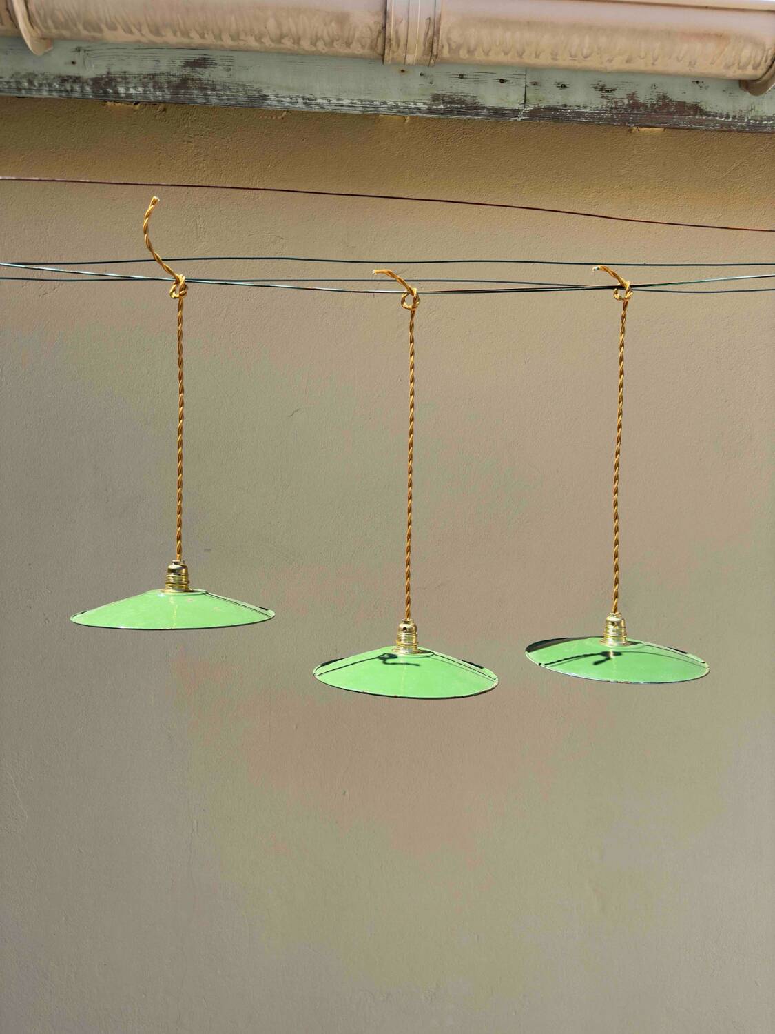Lot of 3 vintage pendant lampshades in green and white enamelled sheet metal, industrial farm