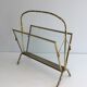 Bamboo-style brass magazine rack from the Baguès house.