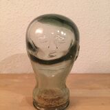Molded glass head curiosity cabinet
