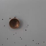 Asymmetrical wardrobe typical of the 50