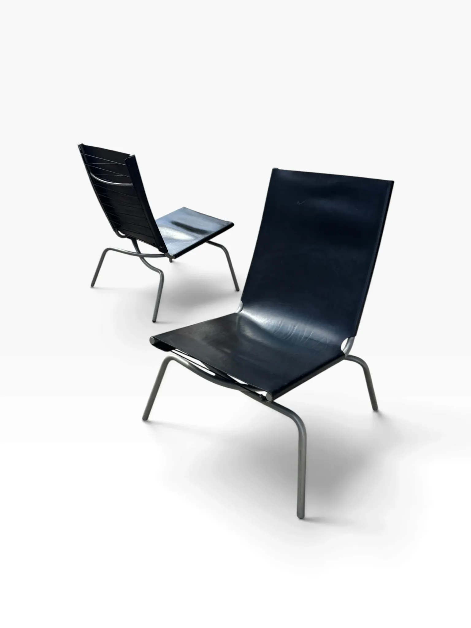 Set of 2 Crossed Legged lounge chairs by Fabiaan van Severen.