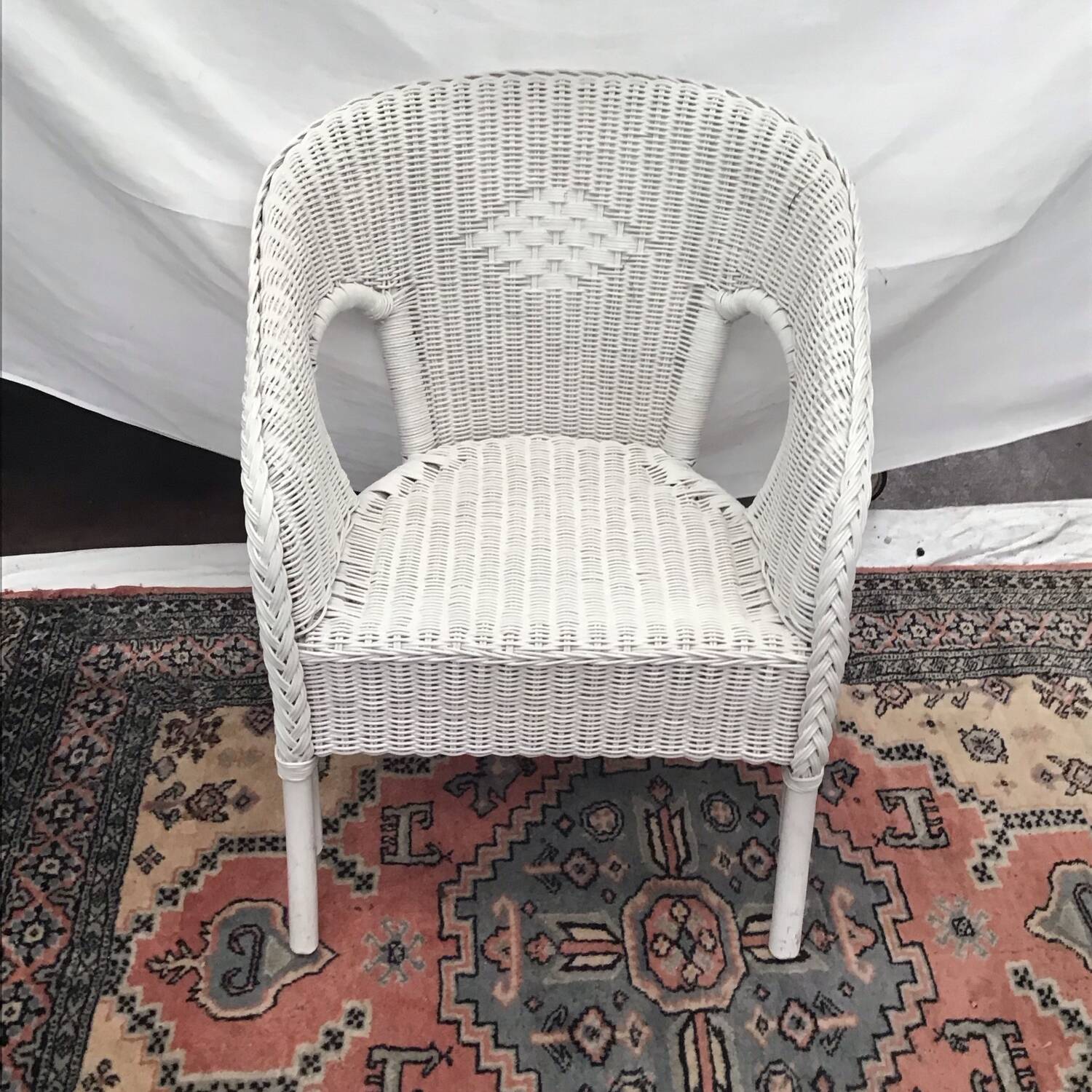 White rattan armchair with pretty vintage