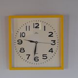 Vintage yellow plastic clock 70s