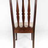 Set of four dining room chairs in rosewood and upholstered with light fabric, 1920s