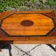 Tale basse vintage en bois massif et marqueterie de marbre