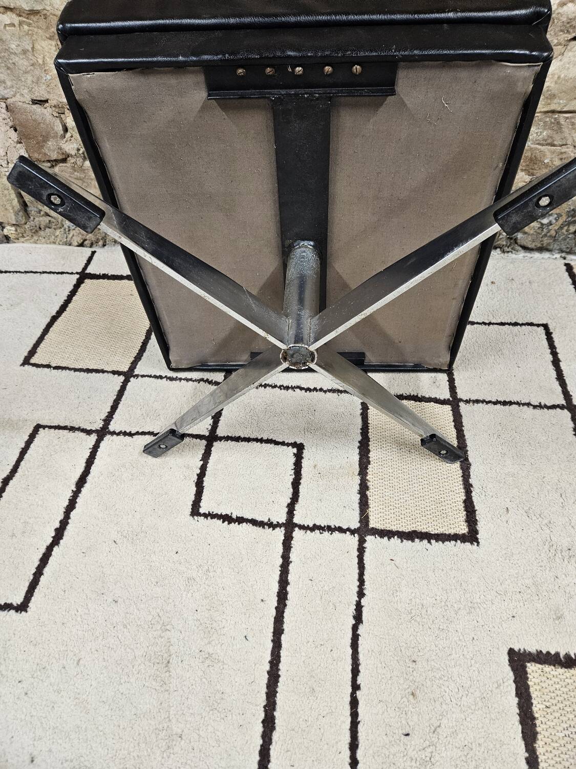 Black leather ottoman 1970 vintage