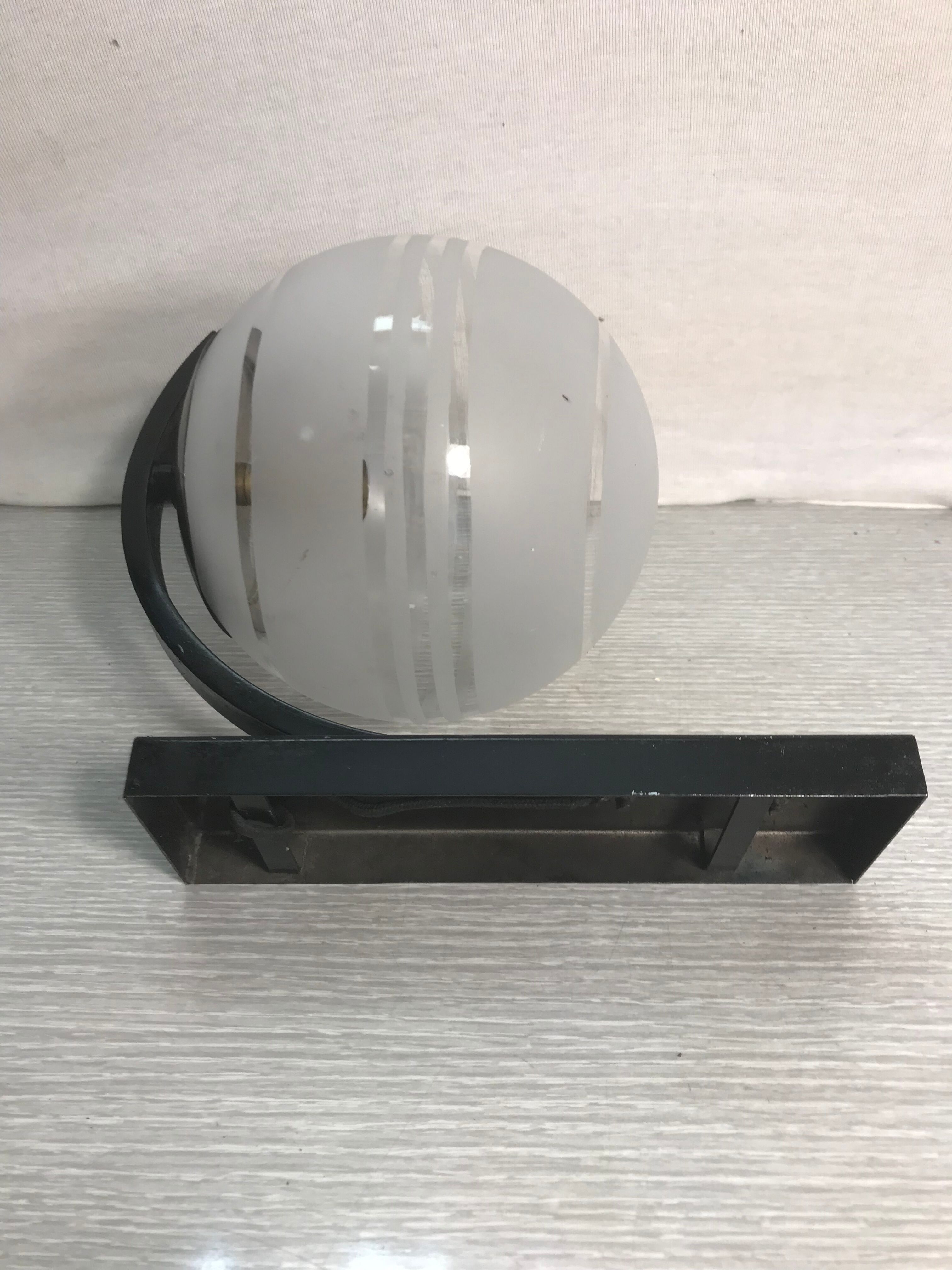 Vintage wall sconce ball-shaped glass reflector and black metal sconce