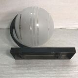 Vintage wall sconce ball-shaped glass reflector and black metal sconce