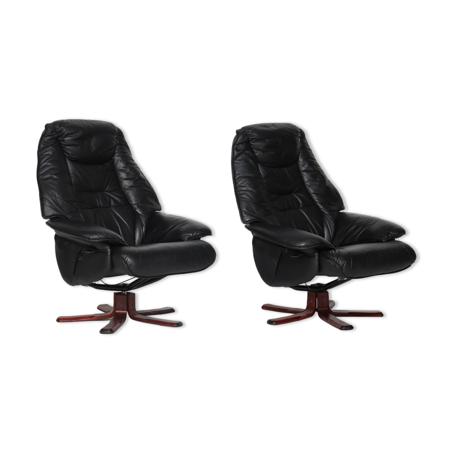 Pair of Danish black leather recliner swivel chairs by Hjort Knudsen