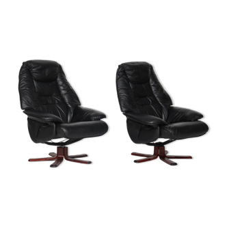 Pair of Danish black leather recliner swivel chairs by Hjort Knudsen