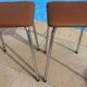 2 vintage stools with faux leather tops