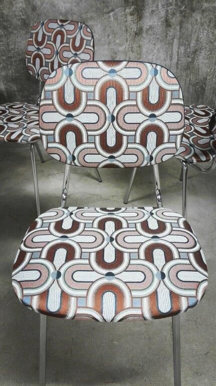 Series of four vintage italian chairs in chrome steel