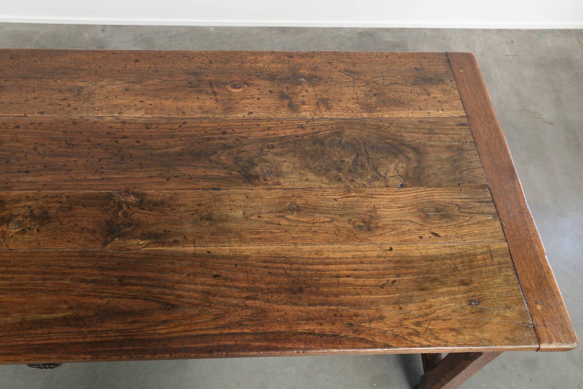 18th century French farmhouse dining table made of oak and fruitwood