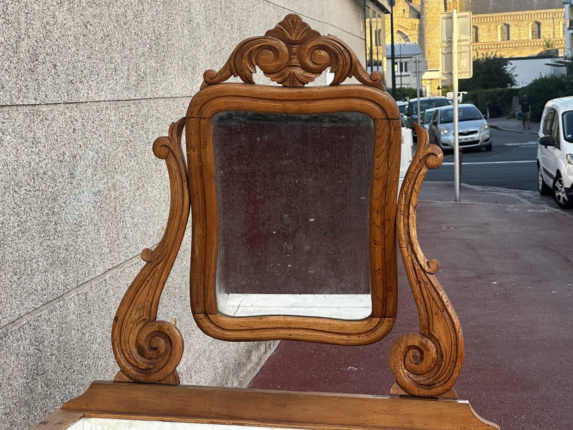 Walnut and marble dressing table, mercury mirror, circa 1850.