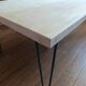 Coffee table in solid bamboo with steel legs.