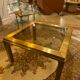 Gold square coffee table and smoked glass