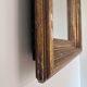 Antique giltwood wall mirror in gold