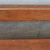 Old wooden bench with cast iron base