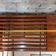 Vintage brutalist bench in solid teak with slats – 1970s