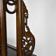 Wardrobe with Asian coat made of wood carved with dragons