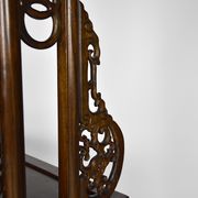 Wardrobe with Asian coat made of wood carved with dragons