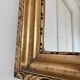 Antique French giltwood wall mirror in gold