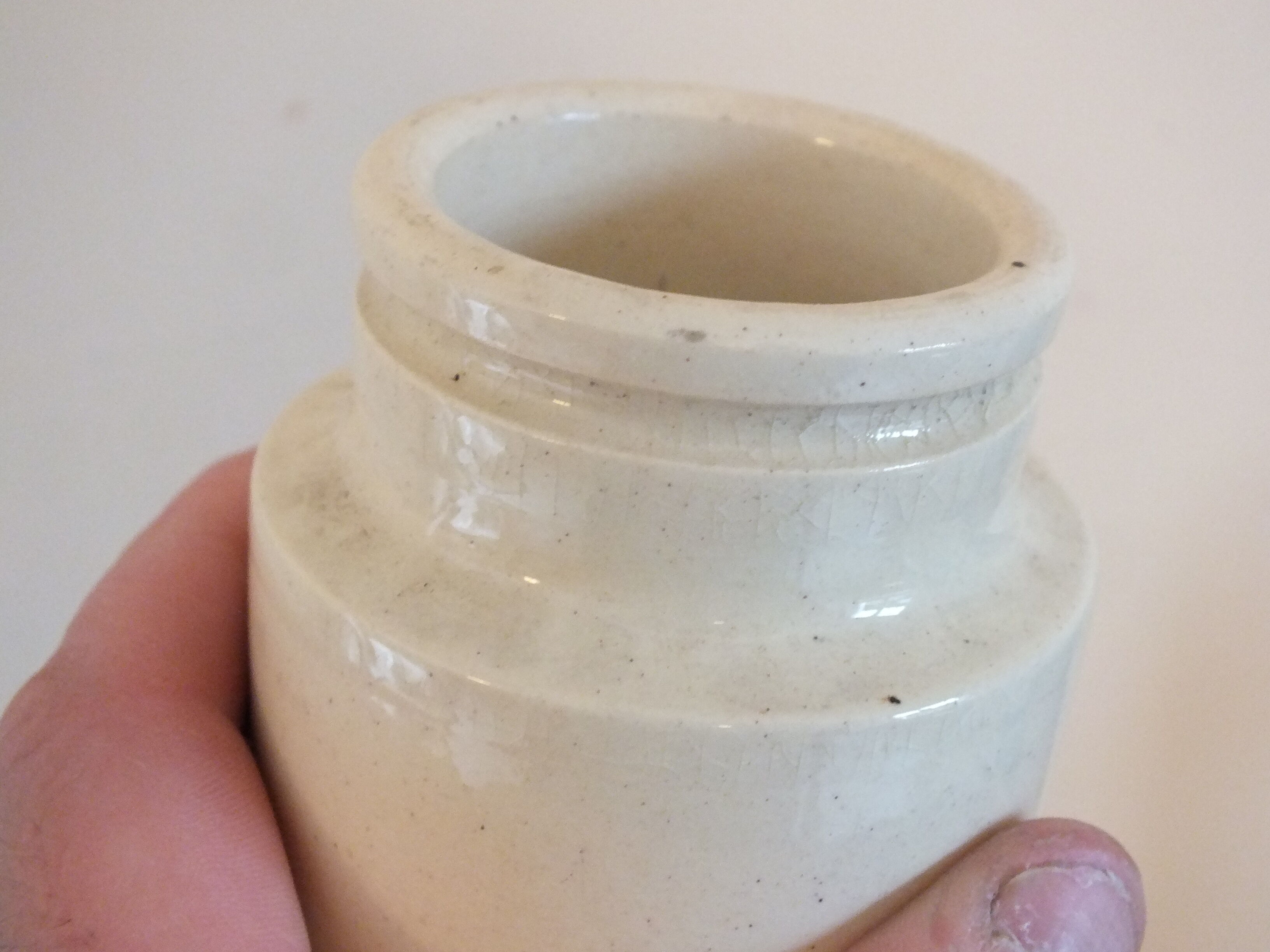 Old creamy white ceramic mustard pot