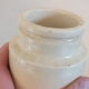 Old creamy white ceramic mustard pot