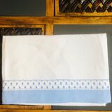 Sheet with blue stripe and embroidered lace