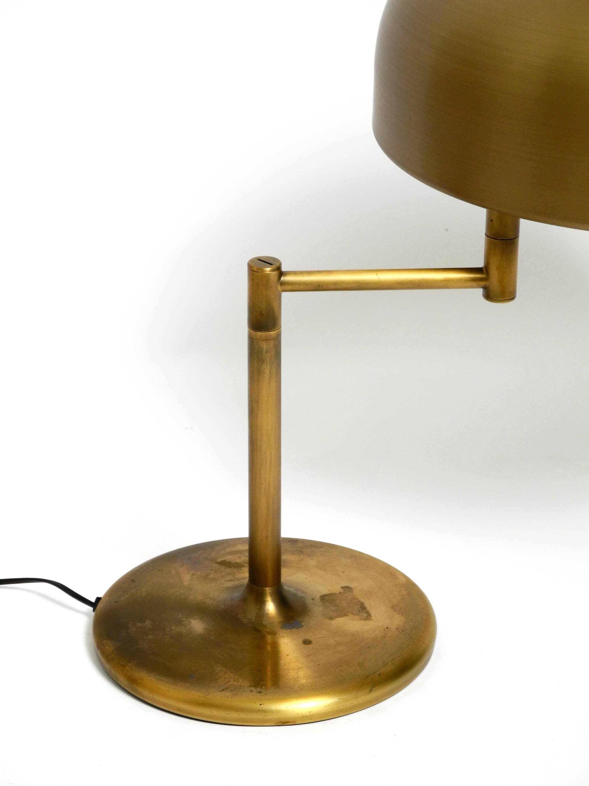Extraordinary heavy 1960s XXL brass table lamp by Staff with a swivel joint