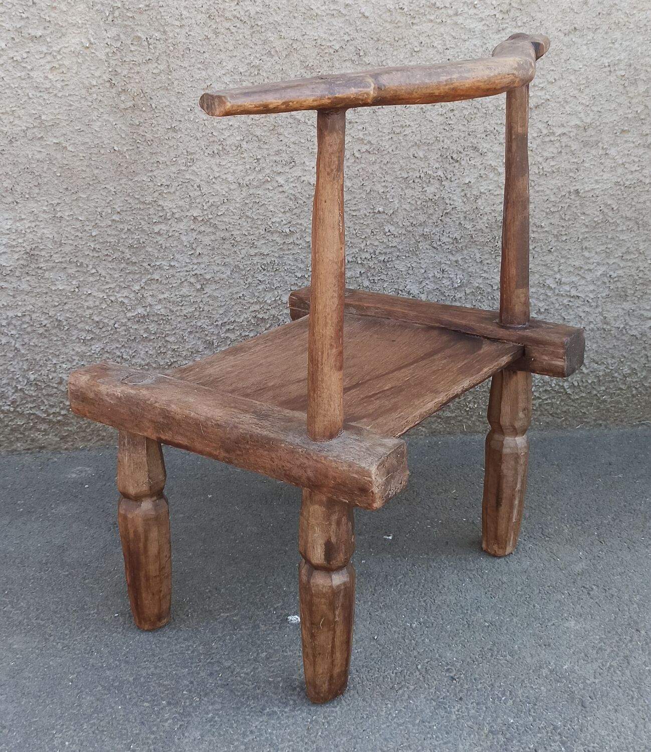 Antique wooden stool. Baoulé African art from Ivory Coast.