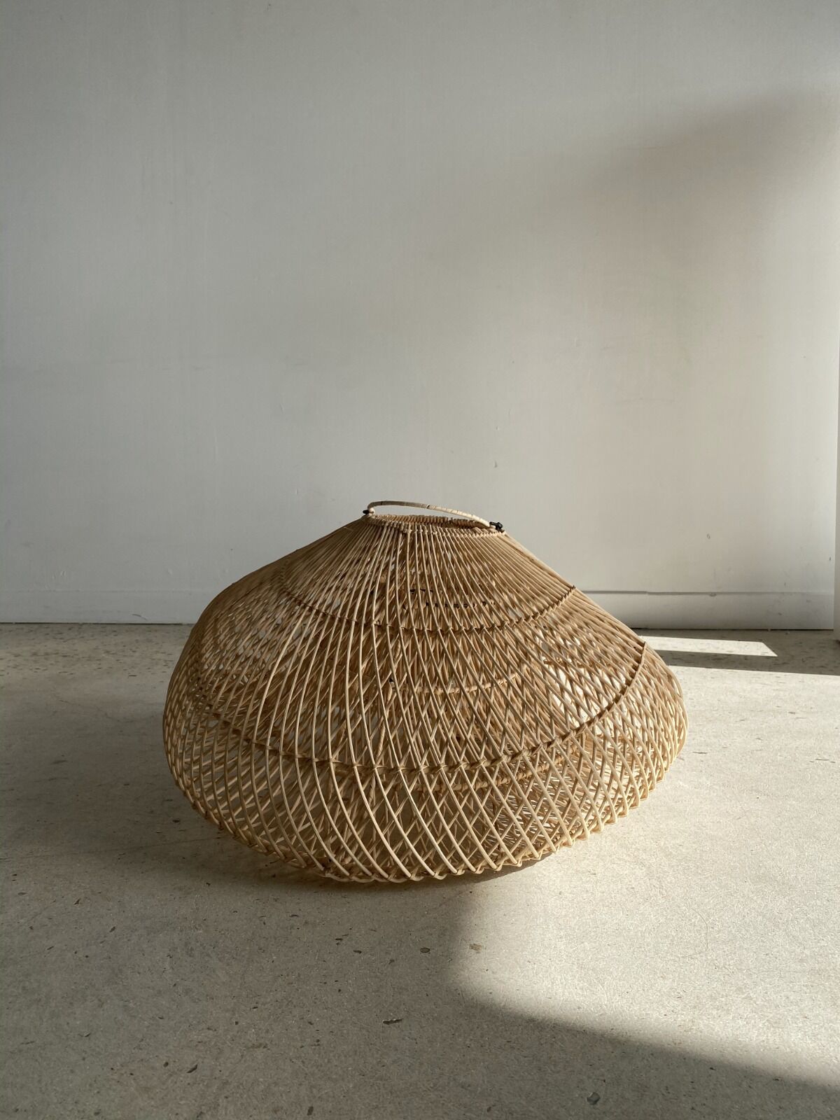 Small rattan lampshade in the shape of a braided hat