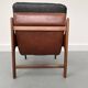 Fauteuil en teck et cuir années 1960