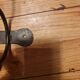 Old iron and porcelain coat hooks