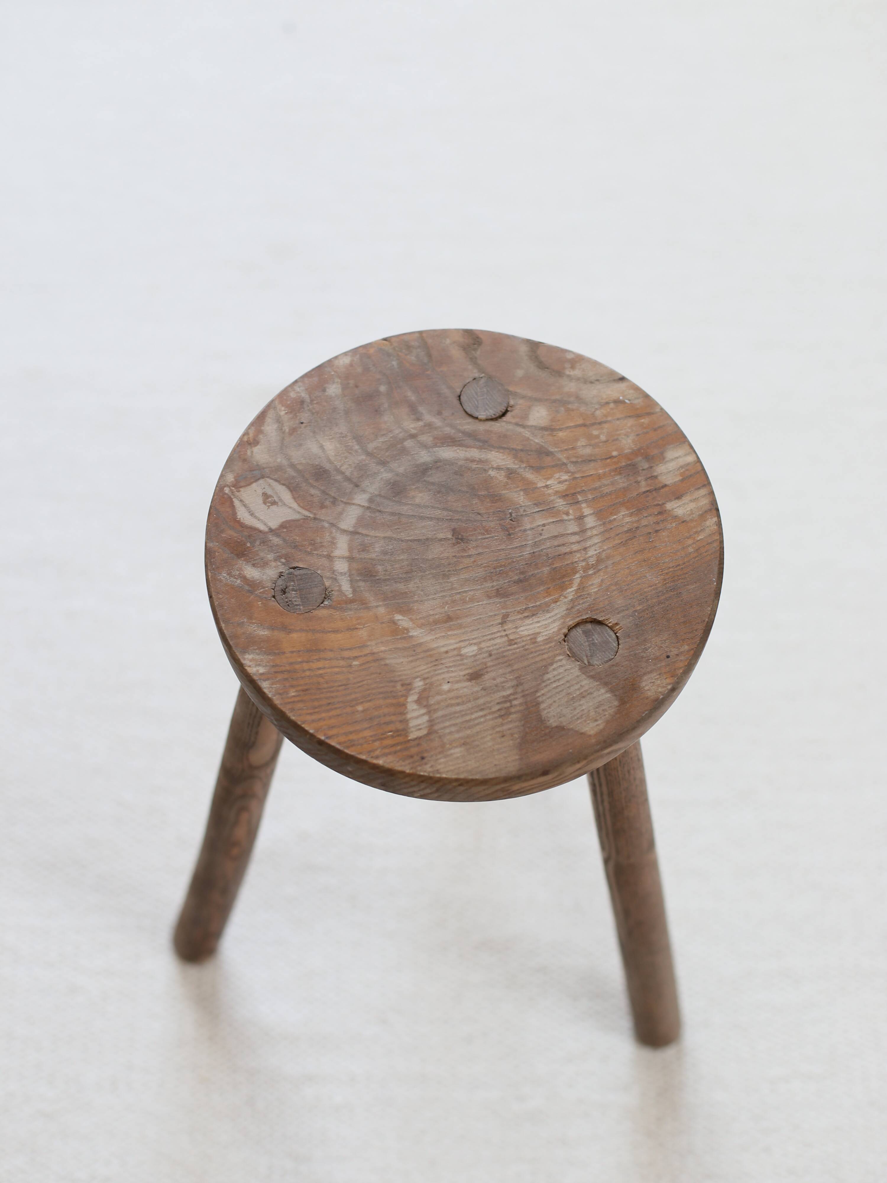 Wooden tripod stool