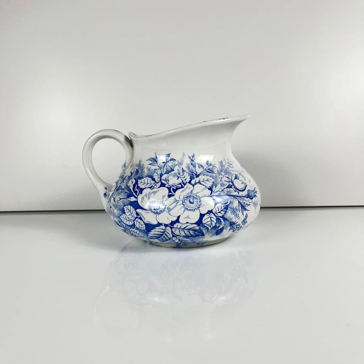 Chubby pitcher, old toilet jug KG Lunéville, blue flower pattern, late 19th to early 20th century.
