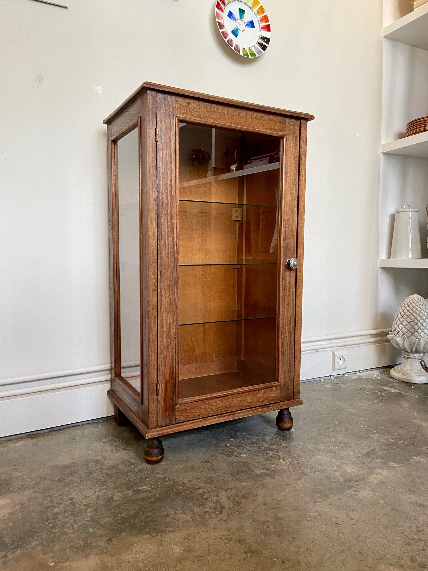 Dark wood display case and transparent glass