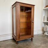 Dark wood display case and transparent glass