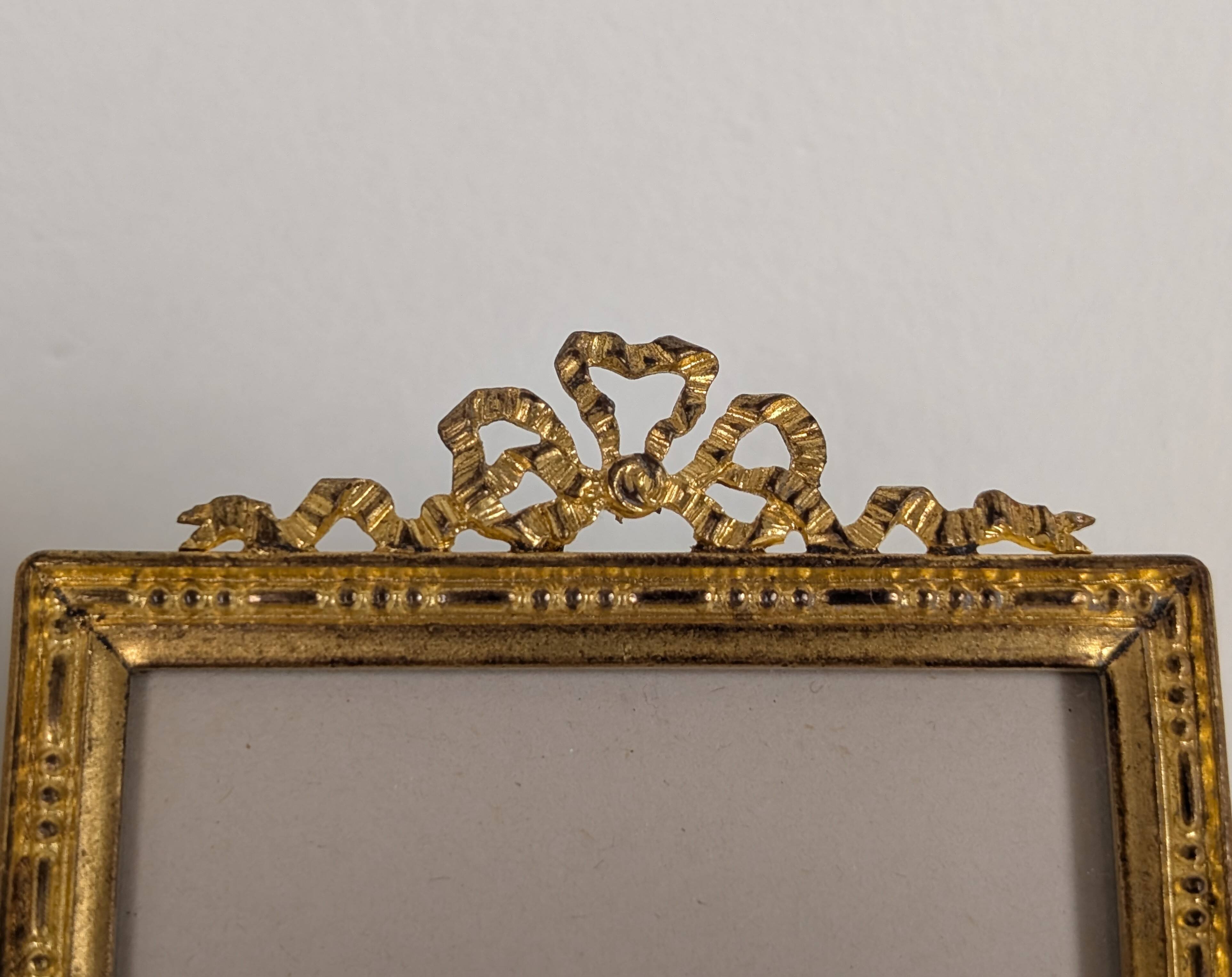 Pair of gilt bronze photo frames