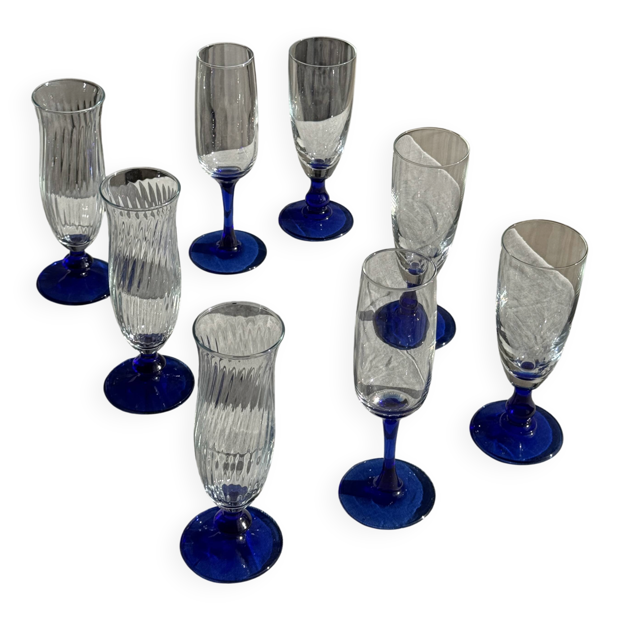 Set of 6 blue-footed champagne flutes; 3 pairs of designs.