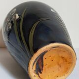 Old enameled earthenware vase with daffodils early 20th century
