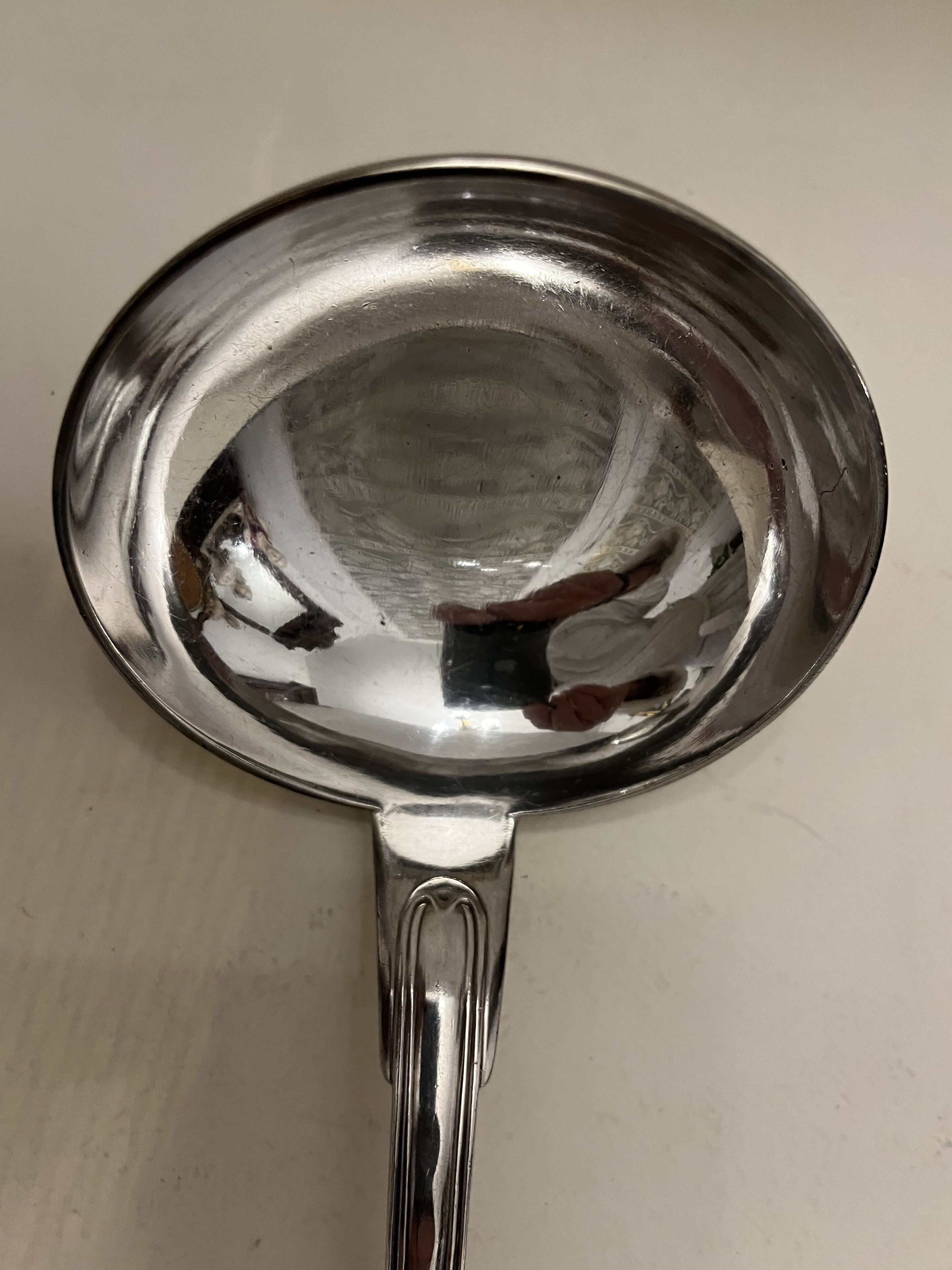 Silver metal ladle
