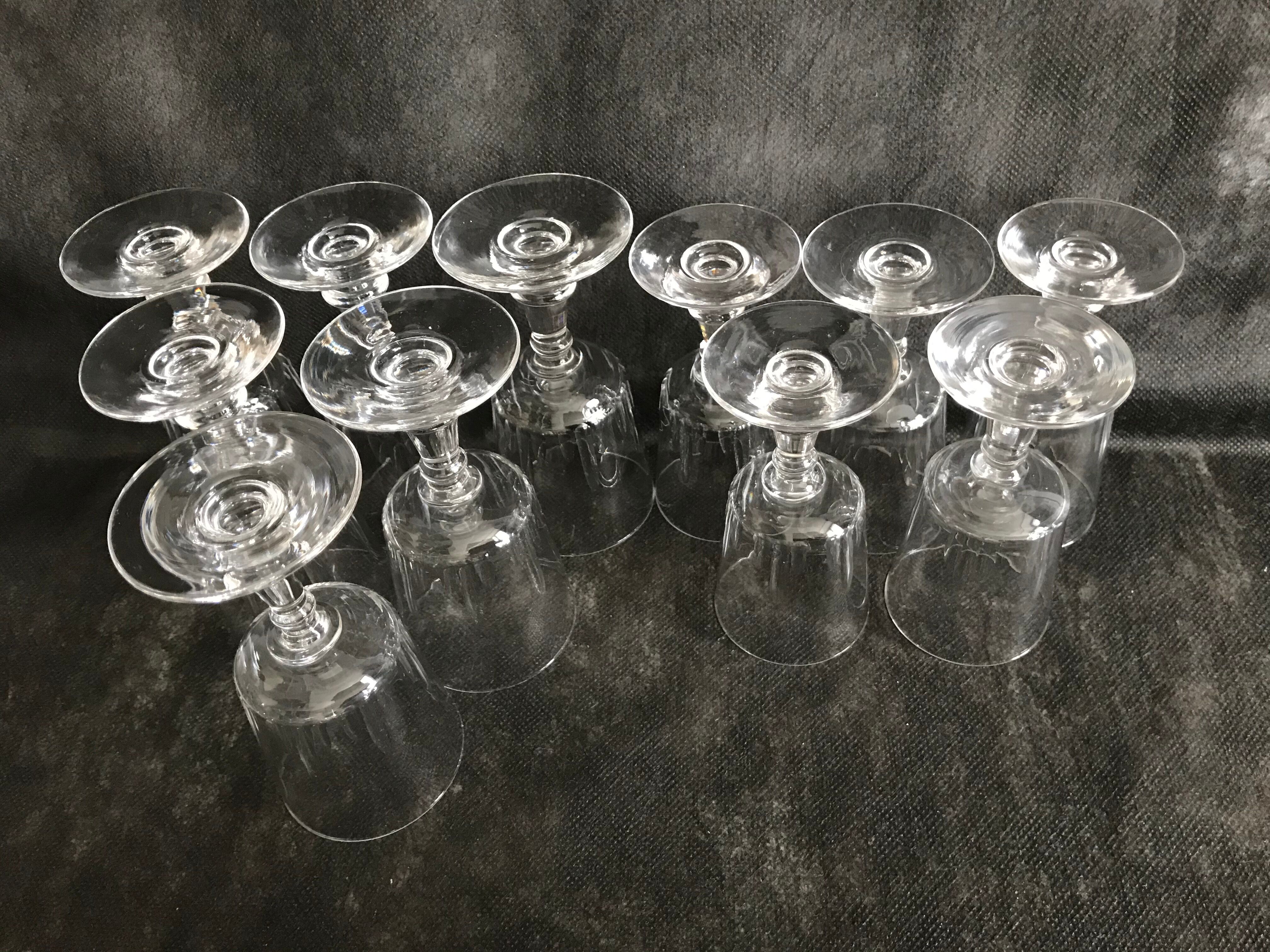 11 glasses and 1 wine carafe