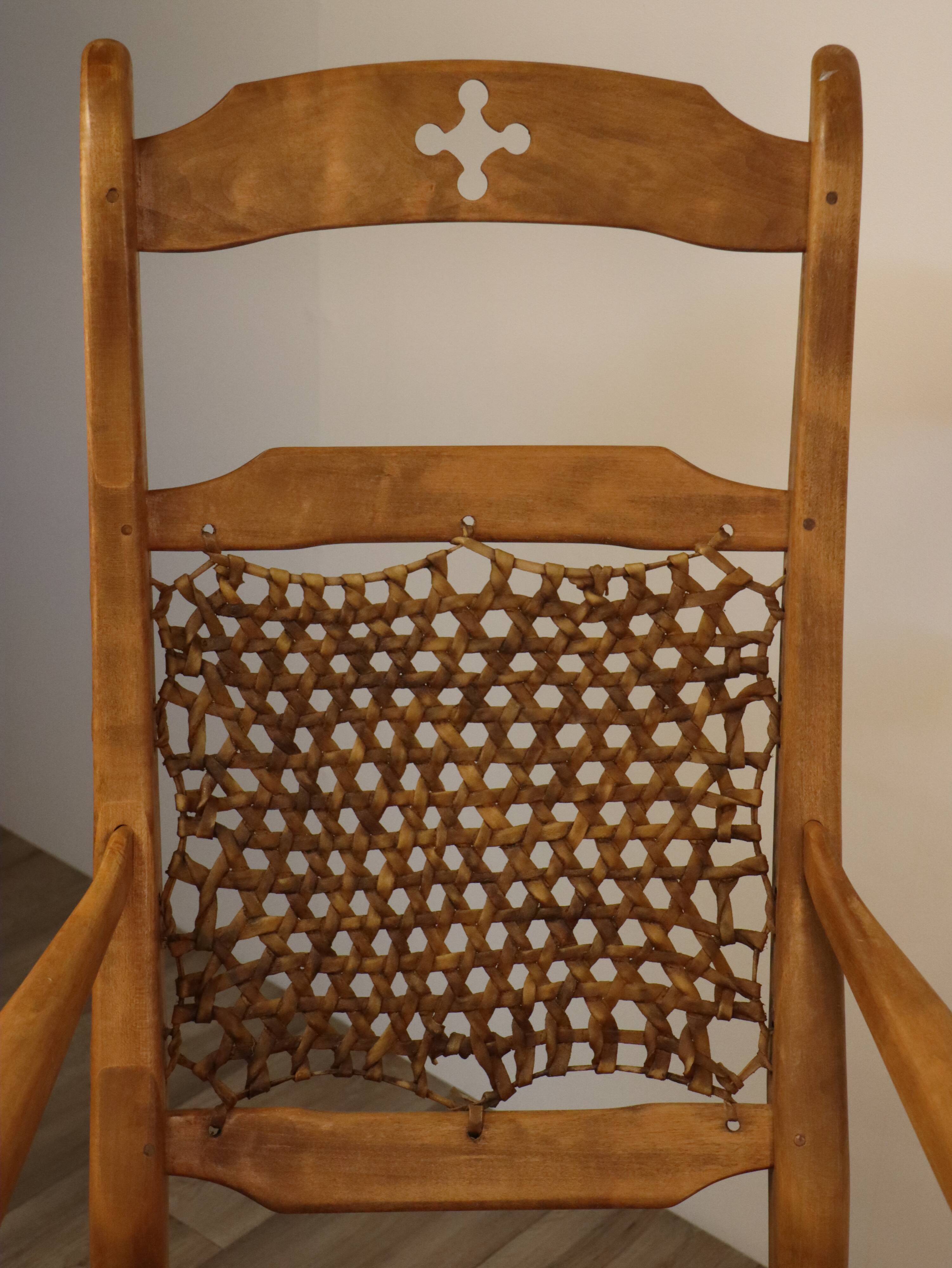 Vintage rocking chair in solid wood 1950