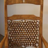 Vintage rocking chair in solid wood 1950