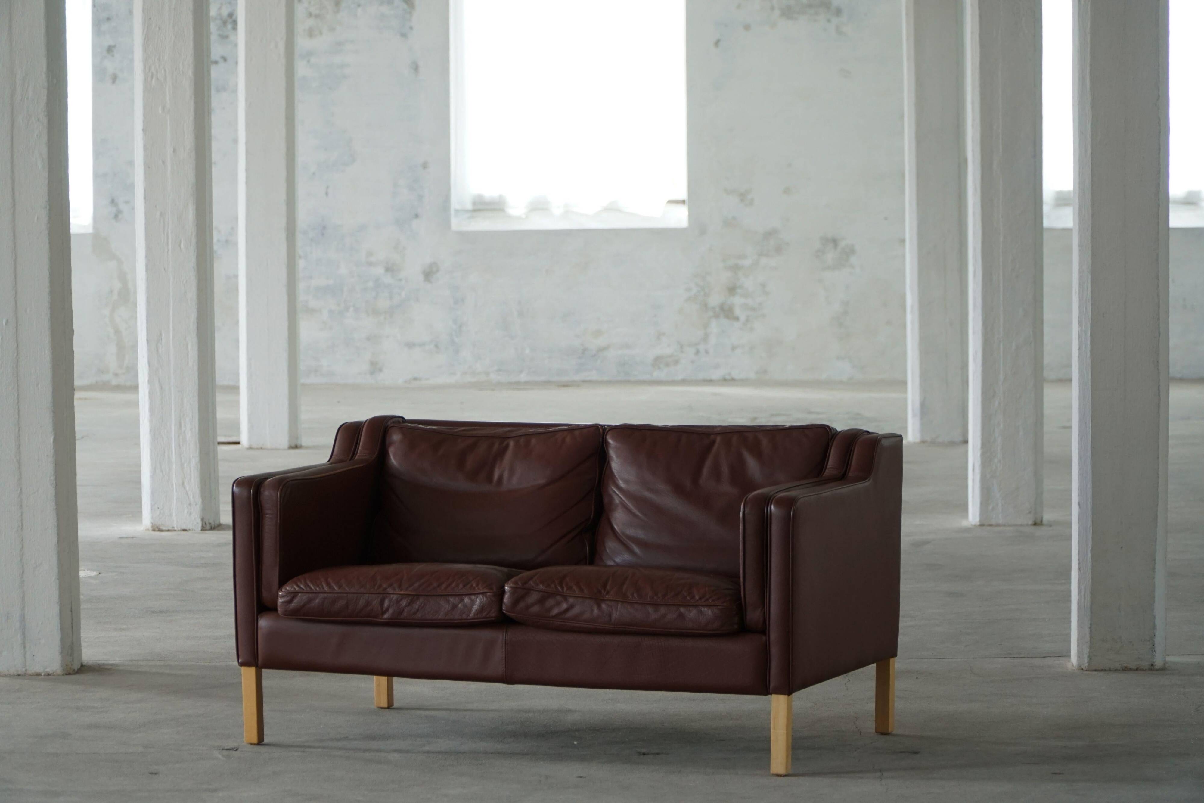 Stouby Møbelfabrik, two-seater sofa in mid-century style in brown leather, 1970s.